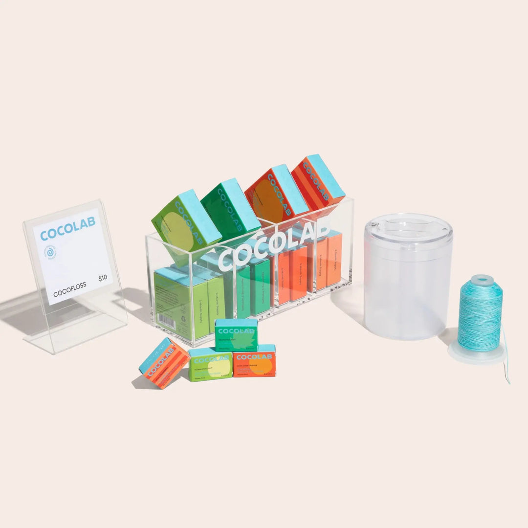 Coco Floss Cocolab woven dental floss with natural fibers, recommended by dentists, shown in a close-up image.